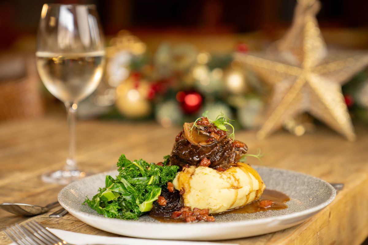 Braised ox cheek with bone marrow mash and kale