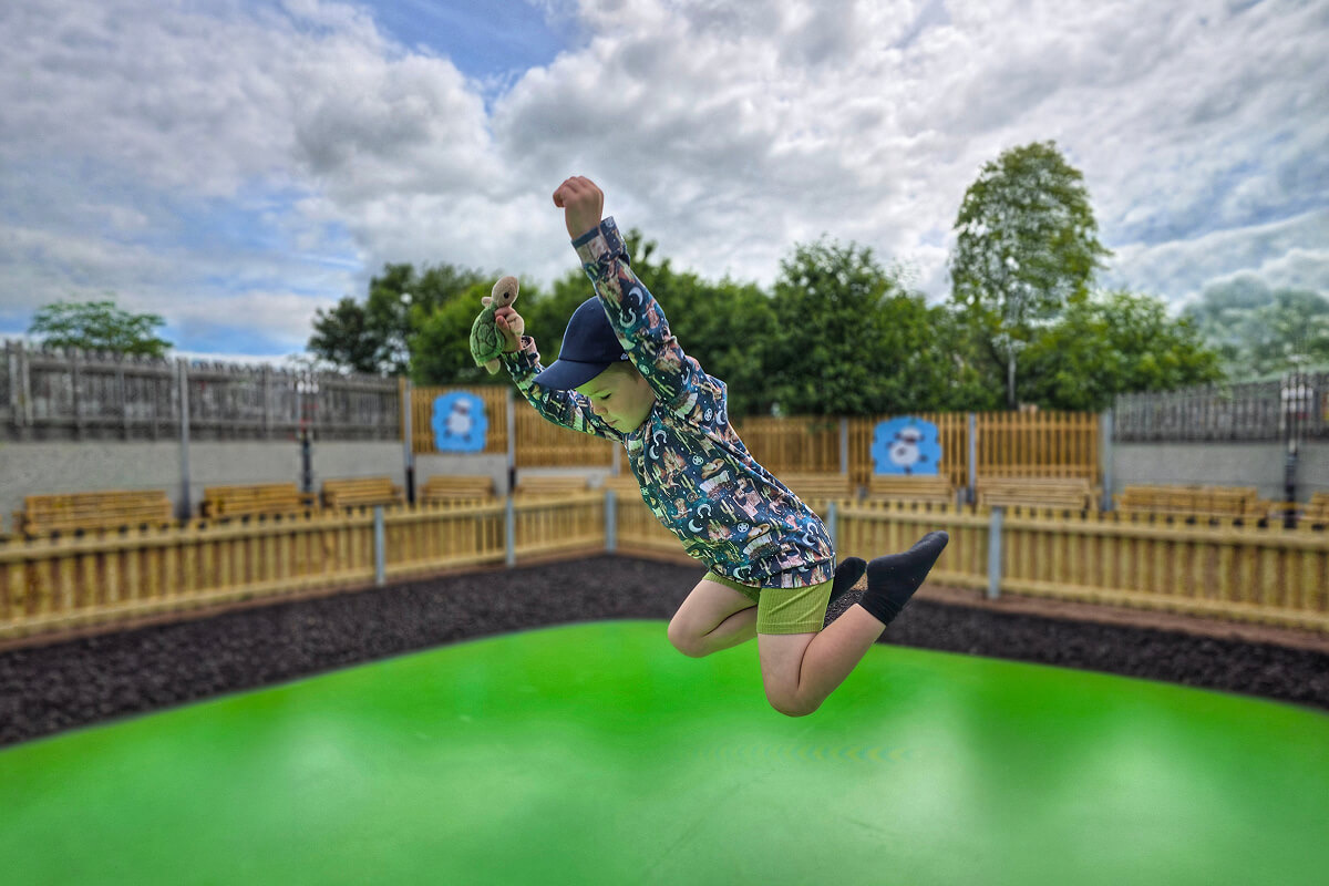 Children bouncing on the Woolly Jumpers bouncing pillows