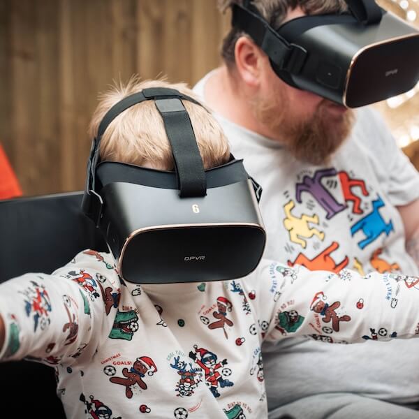Children wearing VR headsets on the sleigh ride